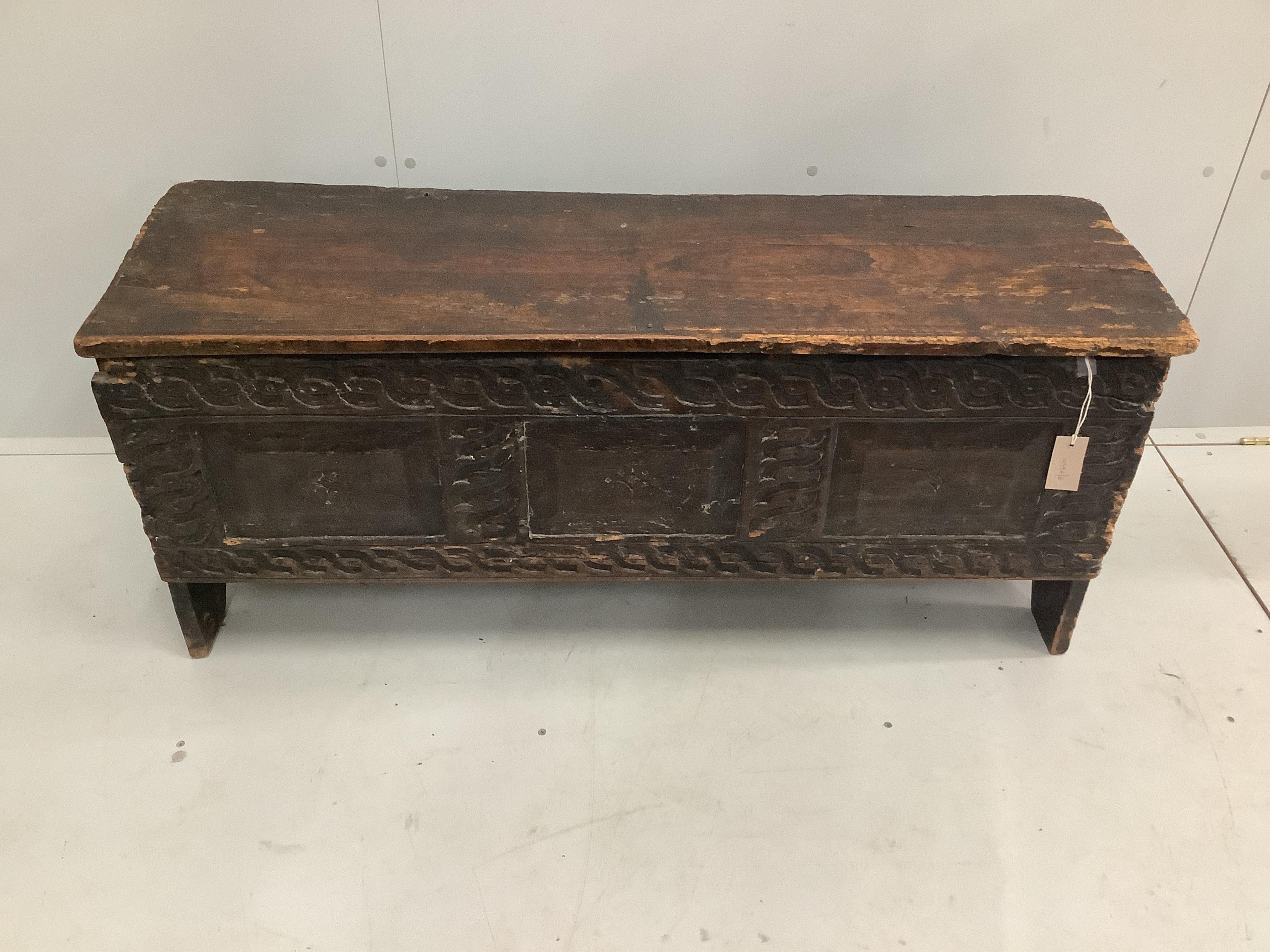 A 17th century and later elm six plank coffer, width 117cm, depth 37cm, height 50cm. Condition - poor